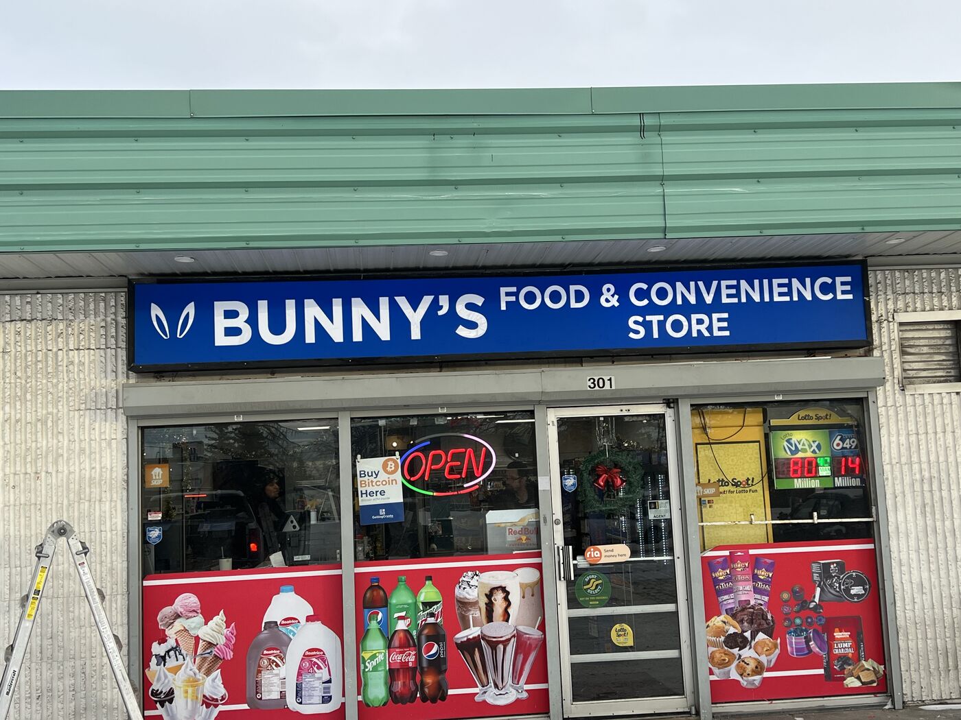 Convenience store storefront sign and window graphics — Action Signs & Graphics