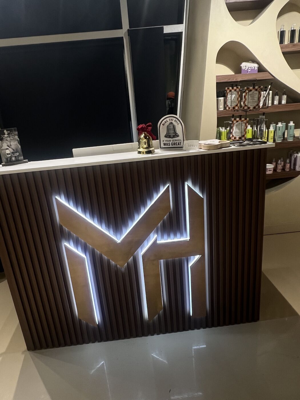 Backlit dimensional logo on reception desk — Action Signs & Graphics