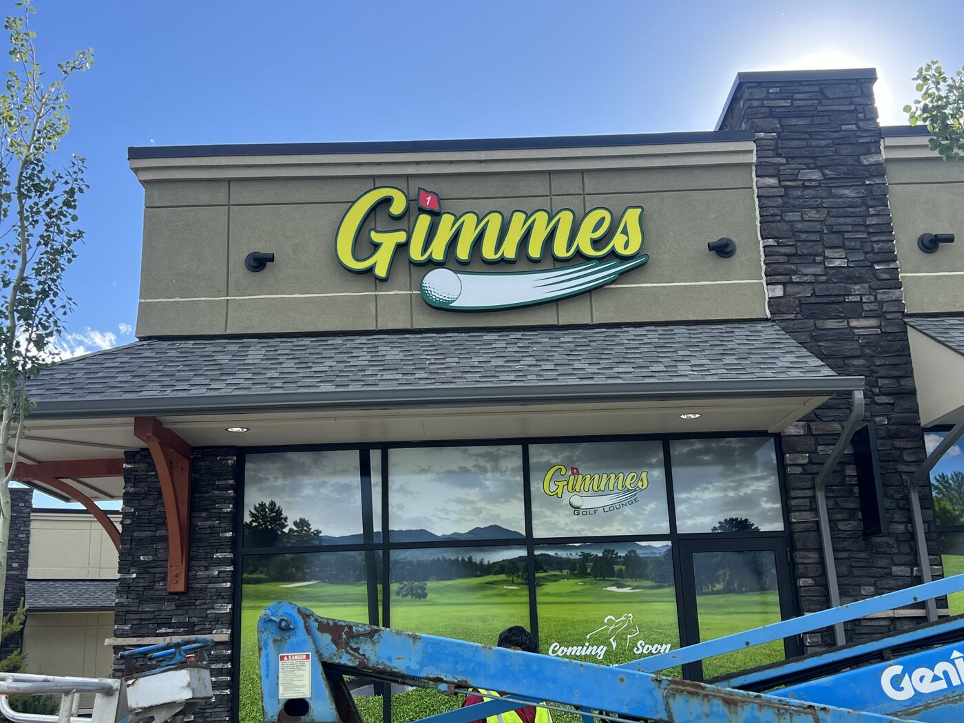 Golf lounge storefront sign installation — Action Signs & Graphics